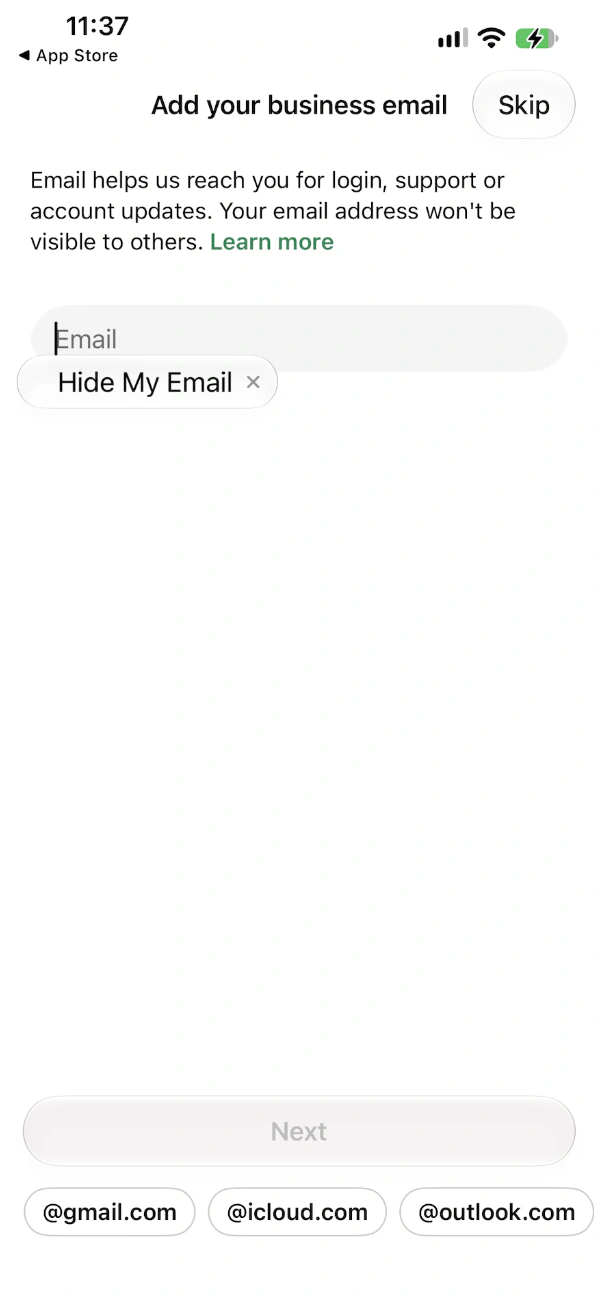 Add your business email screen with an Email field and a Skip button