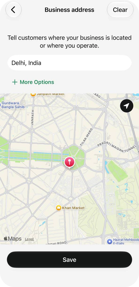 Business address screen with Delhi, India typed, a More Options link and a map