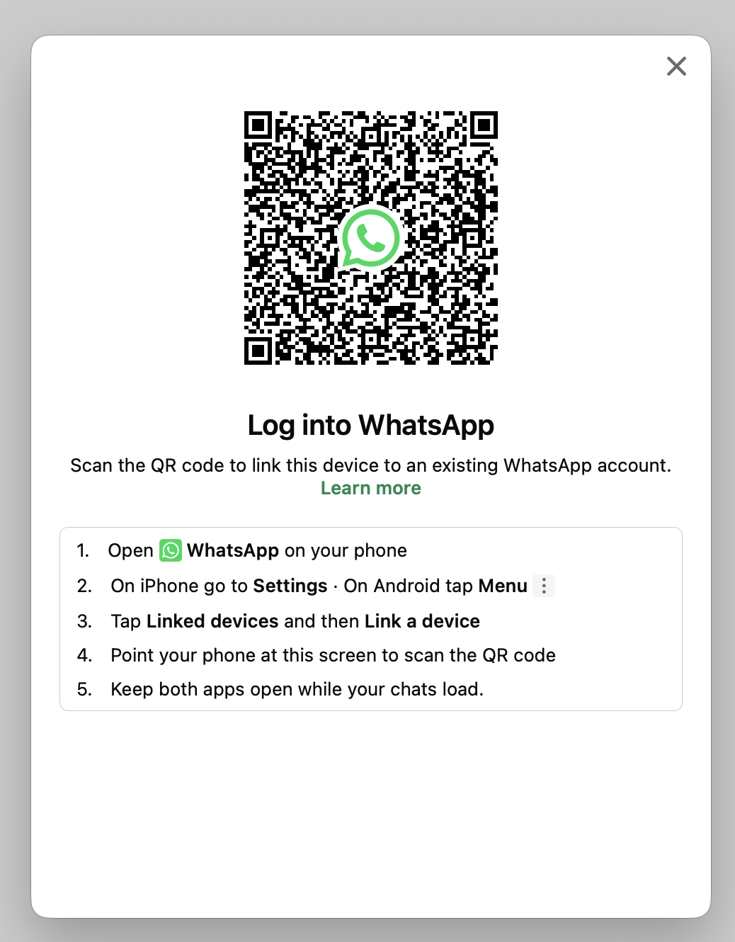 WhatsApp Desktop’s Log into WhatsApp dialog, showing the QR code and linking steps